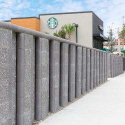 Sturdy retaining wall constructed with durable materials, ideal for landscaping and erosion control